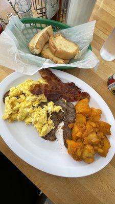 2 Eggs, Skirt Steak is amazing!!!! (Buster Caballo) And it comes with potatoes or French fries. Plus choose your meat on top of Steak