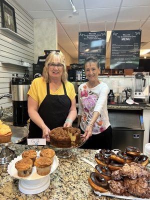 Coffee bar with baked goods.