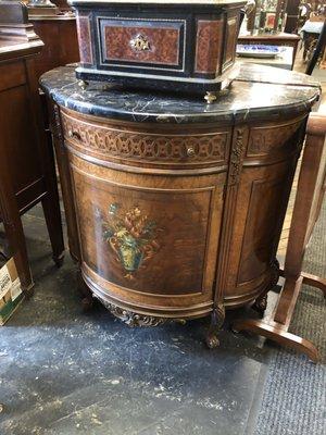 Paul Sormani jewelry box on top of an Adams style marble top console with painted decoration.