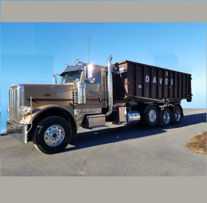 truck with a 30 yd. dumpster