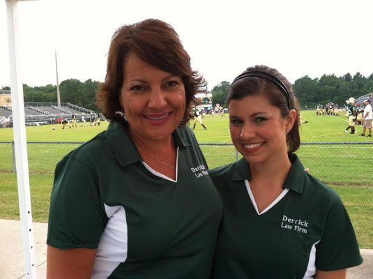 Derrick Law Firm employees pose for a picture at the Carolinas Kickoff Clash football event sponsored by the Derrick Law Firm.