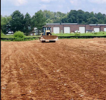 Skid steer and grading services.