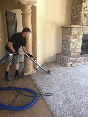 Using a wand to deep clean carpets in peoria, az