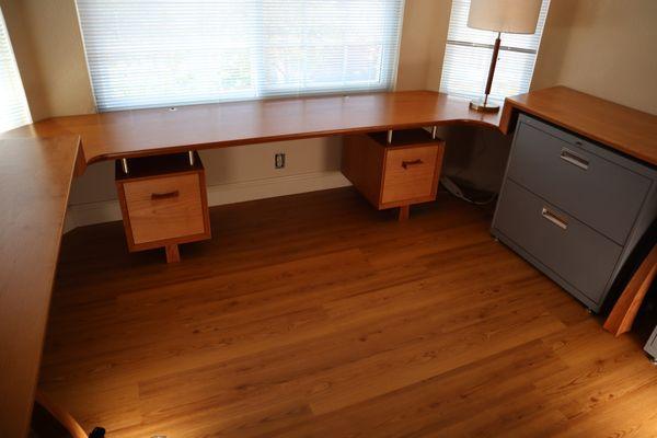 Desk is templated to the room. Waterfalls down to expose the whole window.