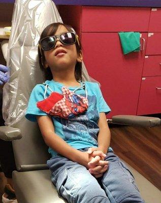 my son looking cool at the dentist office.