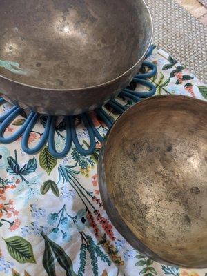 Antique singing bowls used for sound healings and sound baths.