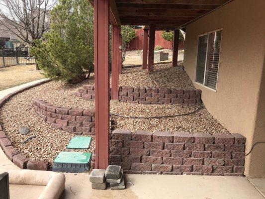 We move gravel and build retaining walls