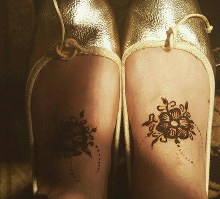 Henna tattoo. Happy feet.