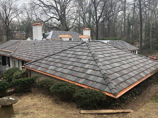 Preferred installs clay tile roofs including copper gutters/downspouts.