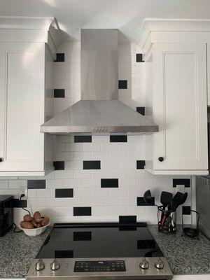 Gorgeous tile work, new cabinets and granite countertop.