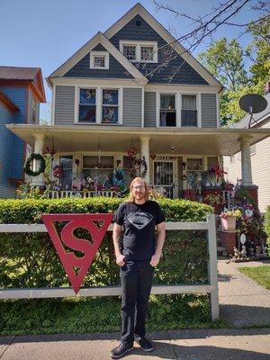 Out front of the Superman House.