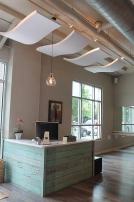 Front desk area with a bonus shot of our acoustic sound clouds