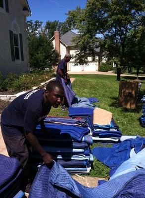 Employee's hard at work padding up the furniture