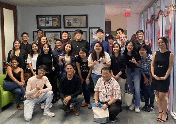 The team hosting the Kapi'olani Community College for an office tour in December 2019.