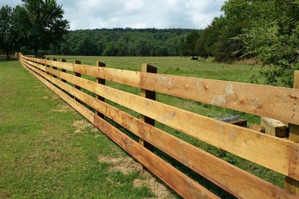 Four rail board fence