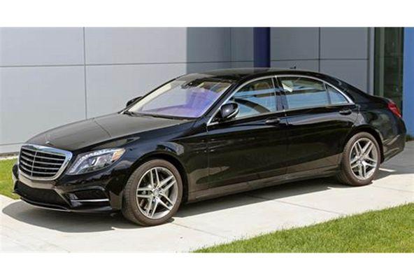 Mercedes-Benz. Black, 4-door, tan interior