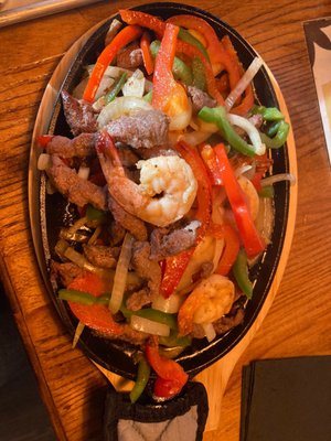 Shrimp and steak fajitas -- large portion and so delicious! Steak and shrimp were tender, cooked perfectly