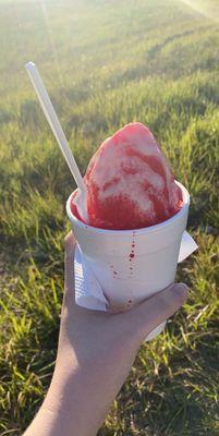 Large strawberry with condensed milk