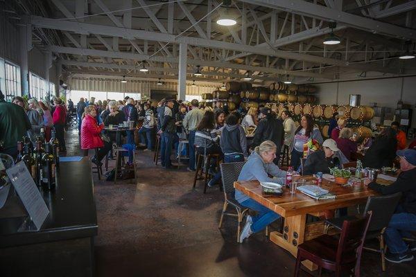 The tasting room at Riggers Loft. The view of the bay is accessible from the whole tasting room. A patio will be built mid-July 2017.