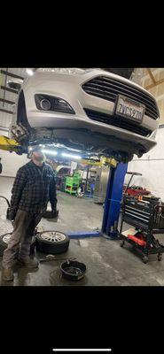 Miguel (Owner ) taking a gander at the catalytic converter were replacing!