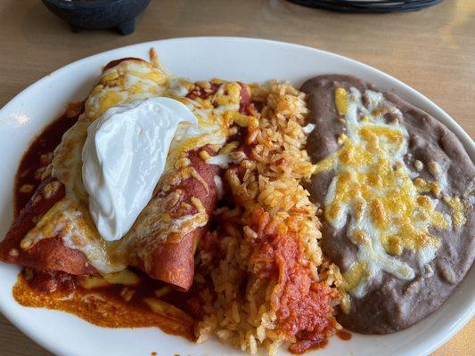 2 Enchiladas a la Crema, one chicken and one carnitas with rice and beans