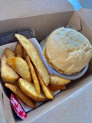 Fuddrucker burger with cheese, Fudd Fries, a brownie, and a drink. $16.35 (10/2022)