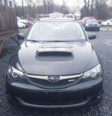 2010 Subaru 5dr WRX AWD. Manual trans,H4 2.5.L, 126000 miles.