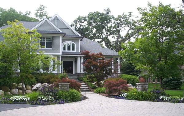 Bloomfield Hills landscaped front walk and brick paved circular drive.