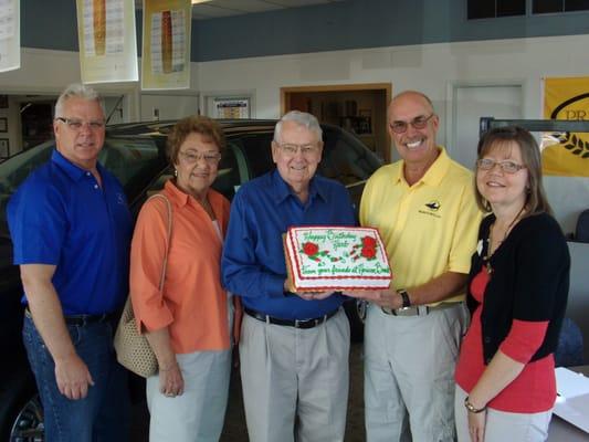 Horicon Bank with birthday cake at Herb Lidtke's 90th celebration.