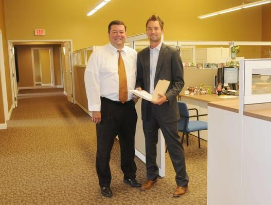 David Thompson (President) and Andrew Thompson (Vice President) inside our newly renovated offices.