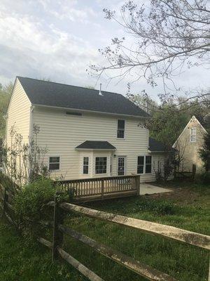 Rear of fire damaged home.