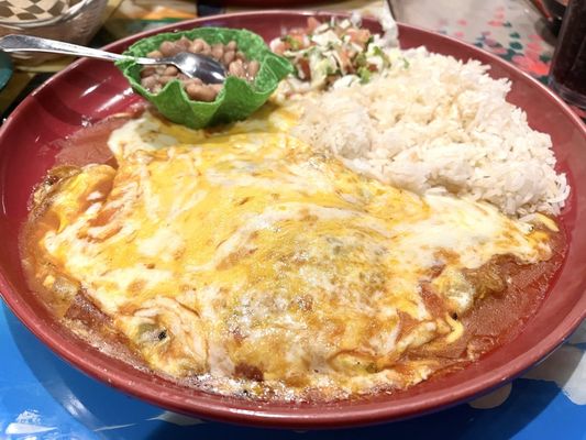 Chile relleno omelet with white rice and rancho beans.