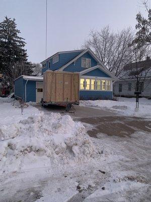 2 of the 4 Packed-to-the-gills U Haul Pods Eric's Moving helped us unload on a frosty Viroqua morning!