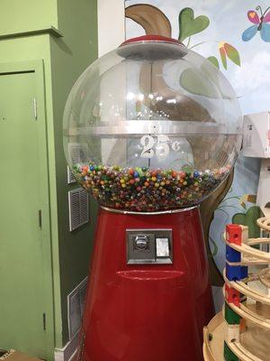 Look at the size of the gum ball machine.  It's taller than a standard door!