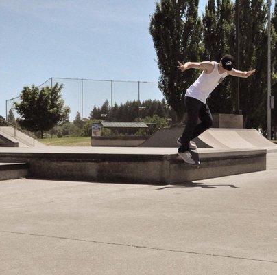 Backside smith grind on the box at tron