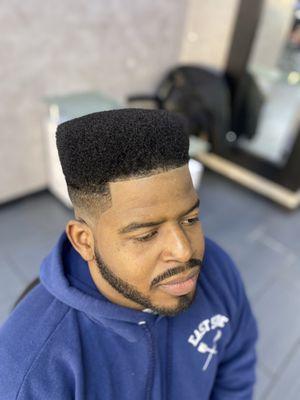 Hightop fade full beard sharp lineup.