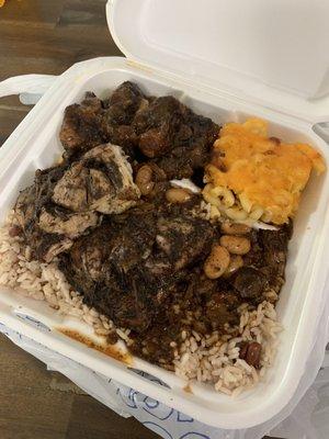 Ox tail, jerk chicken, rice and peas, baked Mac n cheese