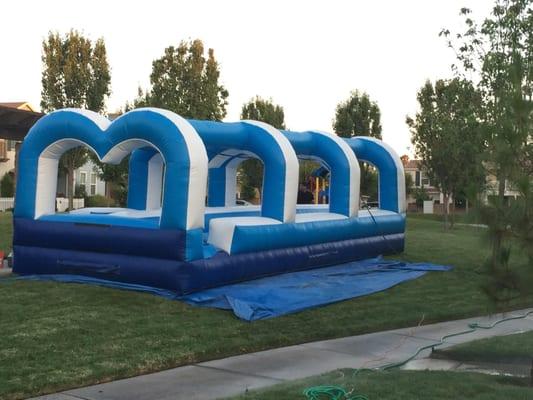 Slip n Slide: Race your friends & family on this dual lane Slip-n-Slide!