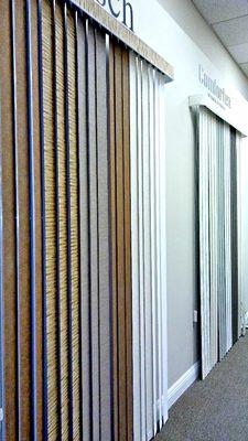 Our vertical blinds come in many styles and materials.  You can't go wrong!