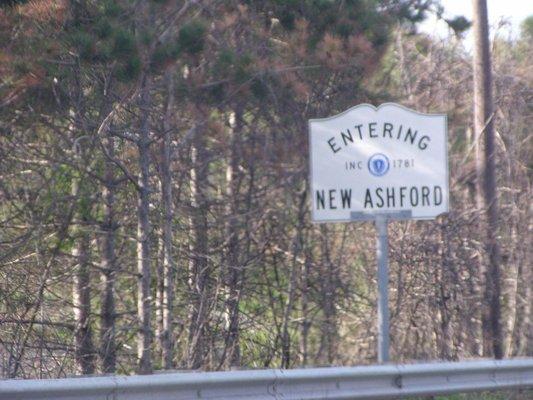 Entering New Ashford from Lanesborough. This sign has been damaged and replaced.