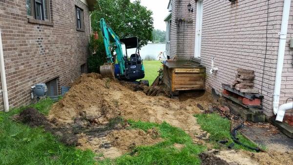 Our Mini Excavator digging for an Emergency Water Service Repair.