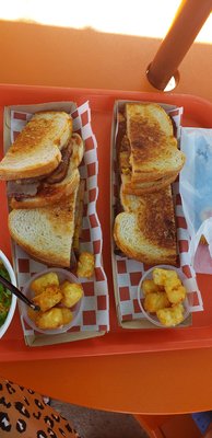 BBQ Brisket melts with sides of tater tots