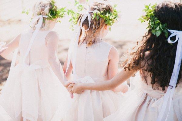 Sweet halo's of greenery for these flower girls.