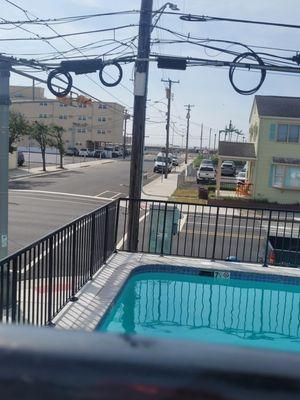 View from deck above pool, showing distance to boardwalk in background.