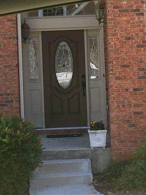 Replaced metal front entry door and two sidelites with fiberglass door and sidelites.