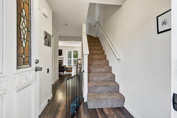 High quality hardwood floors on ground floor and carpet upstairs