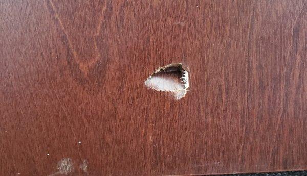 Hole in door.