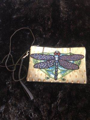 Cute little dragonfly cross body! I've received compliments galore on this bag!