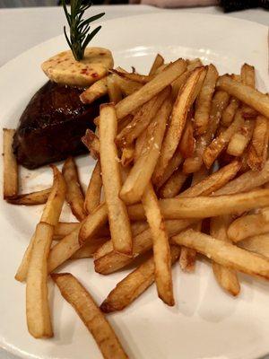 Grilled filet of beef w/a garlic sundried tomato butter and house made fries