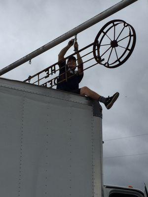 Taking down the sign!